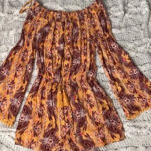 Women’s romper. Brand is wanderly, Xtra-Small